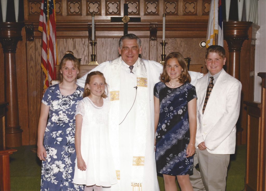 Pastor with confirmation class