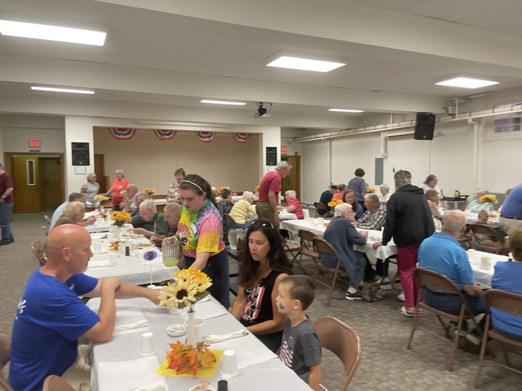 September 2023 community dinner dining room picture.