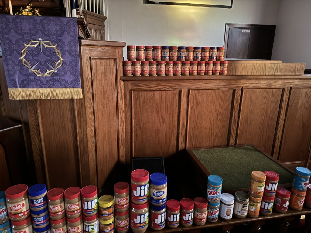 Part of our Lenten collection of peanut butter for the Middletown Interfaith Food pantry in the front of the sanctuary